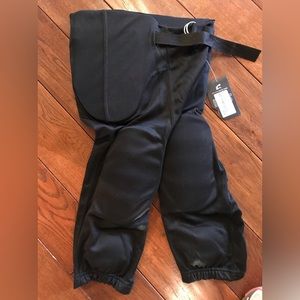 Adult SM black padded football pants/new with tags